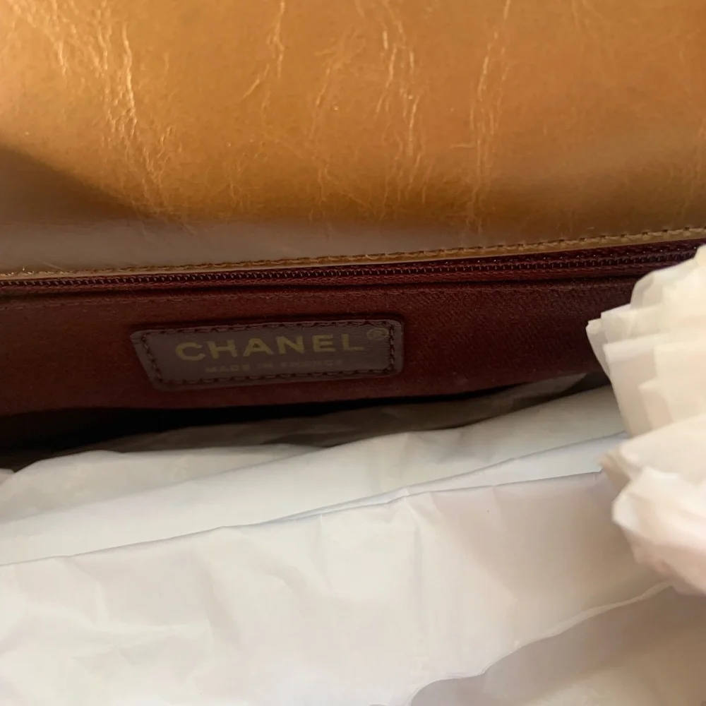 Classic brown lamb‎ skin Chanel handbag with shoulder strap